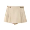 Suisses de survêtement pour femmes boucle en cuir solide à printemps set 2 pièces O-cou tops sans manches plissés mini jupes shorts pour femmes mode pour femmes