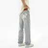 Jeans masculins cousant le style hip hop de mode américaine