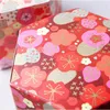 Boîte à cadeaux mini-cadeaux de haute qualité Plum Blossom Boîte de bonbons de mariage hexagonal de bijourie créative Cupcake Favor Boîtes pour l'emballage