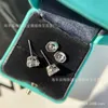 Luxury Brand Home Earrings T Family 925 Sterling Silver Four Claw Round Single Earstuds Simulation Hearts Eight Arrows High Carbon Diamond for Men and With Logo