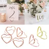 15pcs Love Shape Metal Clip Photo Stands Table des panneaux Numéro de table Numéro Place Carte Place pour la fête d'anniversaire Clip de message de décoration bricolage