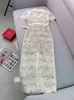 Robe ceinturée de dentelle florale printemps d'été