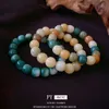 Nouvelle perle ronde d'épissage en résine de style chinois avec sens de design personnalisé, bracelet à tempérament à la mode et polyvalent