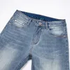 Jeans masculin printemps d'été mince masculin slim slim américain calicon marque haut de gamme petit pantalon droit Q9576-00