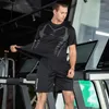 Suisses de survêtement masculines Contrôle de sport Contrôle de t-shirts à manches courtes Shorts en deux pièces de grande taille