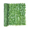 Dekorativa blommor konstgjorda murgröna häck grönt bladstaket panel trädgård integritet realistisk värmetät
