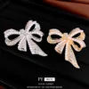 Illusionary Diamond Studded Pearl Bow Brooch with High-end Feel, Sweet Temperament, A Small and Versatile Design Feel Accessory