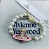 Ontwerper Viviane Westwood Empress Dowager Email Full Diamond Saturn Pearl Bracelet Womens Classic Pink Planet Bracelet