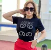 Kvinnor T-shirt Frankrike Trendiga kläder Diamond L Grafiktryck Par Fashion Street Photo Cotton Round Neck Short Sleeve Tops Tees