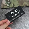 Nous sommes tous fous ici patchs ir réfléchissant Cheshire Cat Eyes Eyes Armée Morale Badge tactique pour les sacs de vêtements Sacs décalcomanies