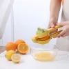 Limone spremiatore Hend tenuto spremuto spremiagrumi doppia ciotola manuale di calce lime manuale arancione spremiata spremitura manuale della cucina