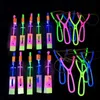 LED Flying Toys 10/1pcs Childrens Arrow Rocket Toys Luminous Flash Led Lighting Up Rubber Band Catapult Games Outdoor Elastic Fast Flying Gifts 240410