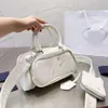 Diseñador de bolsos 50% Descuento en bolsos para mujeres de marca caliente para bolsos para mujer de mano nuevos en un hombro versátil