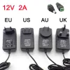 AC DC 12V 2A 2000MA Adaptateur Adaptateur Adaptateur EU UK AU PLIG US 5.5 * Chargeur mural de 2,5 mm pour la lampe lumineuse à bande LED féminine mâle DC