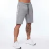 Homens com algodão magro esportivo de bermuda de bodybuilding calças de moletom de fitness calças curtas academias esportivas shorts de basquete 240401