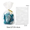 50pcs Plume Plastic Sac de Pâques Pâques d'anniversaire Candy et bonbons Sacs-cadeaux Natal Antré