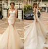 Crystal Design Meerjungfrau Brautkleider sexy nach hinten durch Champagner Spitze Brautkleider Sweed Zug Hochzeitskleid