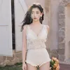 Swimwear femminile in stile coreano Donne spingendo il costume da bagno a v-collo a due pezzi set solido costume da bagno senza schienale