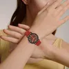 Montre-bracelets à la mode Femmes Horloge Élégante montre une élégance avec un grand nombre à cadran en cuir en cuir Mouvement de quartz pour les filles