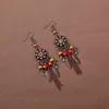 Orecchini da donna e orecchini di bohémien vintage etnici con foglia di legno rotonda foglia di fiori geometrici orecchini lunghi gioielli