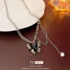 Colar de borboleta de cristal de aço de titânio com um senso de design frio e de nicho, cadeia de clavícula personalizada, novos colares da moda para mulheres