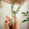 1pcs Green Jade Stone 12 mm Perles Bracelet Collier Bouddhiste Tibetan Bouddha Charme Rosaire Yoga Men Femme Bijoux