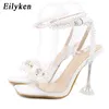 Eilyken Women Sandals 2024 여름 섹시한 공개 크리스탈 하이힐 파티 웨딩 신발 광장 발가락 진주 끈 보우 노트 펌프 240407