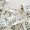 Milancel Nieuwe zomerbabymeisjes Rompelt een-stuk peuter zoete groene bloemen jumpsuit met haarband baby-outfits