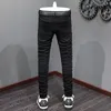 Heren jeans straatmode mannen zwarte stretch punk broek munny fit gescheurde kralen gepatchte ontwerper hiphop merkbroek