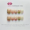 Ongles faits à la main appuyez sur le cercueil design de fleur de longueur moyenne manucuree portable couverture complète artificielle fausses pointes de ongles ensemble japonais 240328