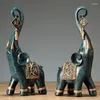 Figurine decorative 2 pcs statua di elefante di resina fortunato elegante elegante ricchezza di figurine ornamenti per il regalo di arredamento per la casa