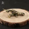 Mässing Jurassic Dinosaur Tyrannosaurus Small Staty Office Desktop Ornament Tea Pets Crafts Animal Figures Miniatures Toy