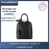 M25103 M25104 Designer -Taschen -Rucksackhandtasche aus Originalleder mit einem gravierten Vorhängeschloss und Lederschlüssel -Bellspiegel Qualify