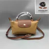 Los bolsos de la tienda están en venta de liquidación 95% de descuento en 2024 Spring Bag Street Fashion Fotografía para mujer Dumpling Pequeño Elección de hombro Bolsos pequeños