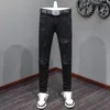 Heren jeans straatmode mannen zwarte stretch punk broek munny fit gescheurde kralen gepatchte ontwerper hiphop merkbroek