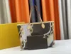 10Aデザイナーバッグ財布ファッションレザーメッセンジャー犬子犬猫古い花ショルダーバッグMMトートバッグM40995高品質