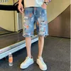 Shorts maschile graffiti uomini strade denim versione coreana Trend pantaloni a cinque punti dritti a cinque punti strappati jeans sciolti maschio