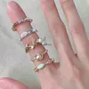 A niche design with a high-end pearl enamel decoration ring for womens fashionable and cute beaded versatile elastic rope index finger ring