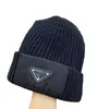 Designer beanie / crânes Caps netizen même style nouvelle version correcte triangle inversé automne / hiver un chapeau en laine tricot à la mode et sans chapeau de sélection de visage