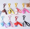 8PCSSET KPOP CARTOOS CORÉAN MODE MODE HEPPORT CLÉ SAG PENDANT ACCESSOIRES ACRYIQUES TÉLÉPHONE ACRYLIQU