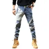 Höst- och vinter Nya mäns lapptäcke jeans, mäns trendiga varumärke, fashionabla och personliga elastiska avslappnade små ben långa byxor
