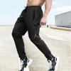 Zomer stretch Men Trackbroeken Casual kleding Elastische taille Jogging Mens Outdoor Training Fitness Adem lang 240411