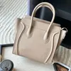 2024 Luxus -Einkaufstasche Klassische Handtasche Einkaufstasche Designer Taschen Echtes Leder Lächeln Gesicht Tasche Trapez Cross Lod Bag zwei Größe für Ihre Option