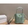 Leather Handbag Designer Sells New Women's Bags at Discount and Triangle Heavy Bucket Bag Single Shoulder Fashion