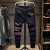 Spring and Autumn Black Trendy Brand Jeans patchwork personalizzato di fascia alta per uomini con patch strappati pantaloni da mendicante elastico