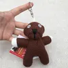 Rolig och humoristisk nallebjörn anime tecknad plysch docka hänge klipp maskin docka liten present leksak nyckelring