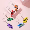 12pcs Racing Cars Party Return Favors Kelechains pour baby shower voitures à thème fête en caoutchouc Racing Keychain Kids Favors Toys