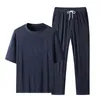 SUSuit maschili Designer Polo Suits Silk Ice Summer Tshirt a maniche corta Tshirt Drying Chave Long Pants Abito da camicie hip hop Coppie 2 pezzi Set tubi di sudorazione