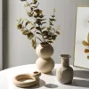 Nordique minimaliste ovale blanc céramique abstrait vase géométrique sculptural / wabi sabi de style scandicy