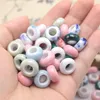 Bunte handbemalte runde Donut-Form-Keramikperlen für Schmuck, die Halskettenarmband hochwertige DIY-Accessoires machen